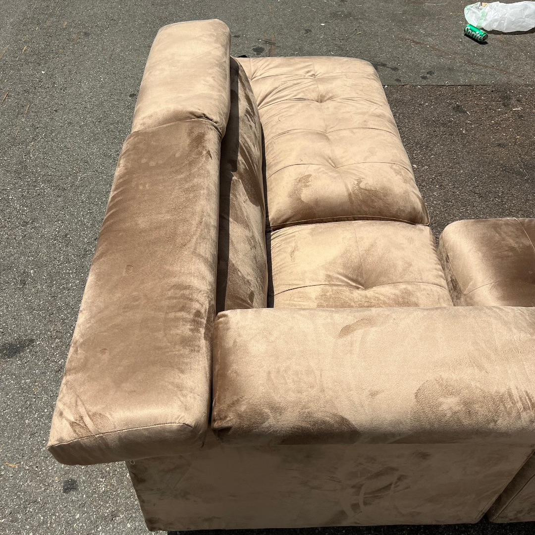 Tufted mocha suede seat and chaise detail of the reupholstered L-shape sectional
