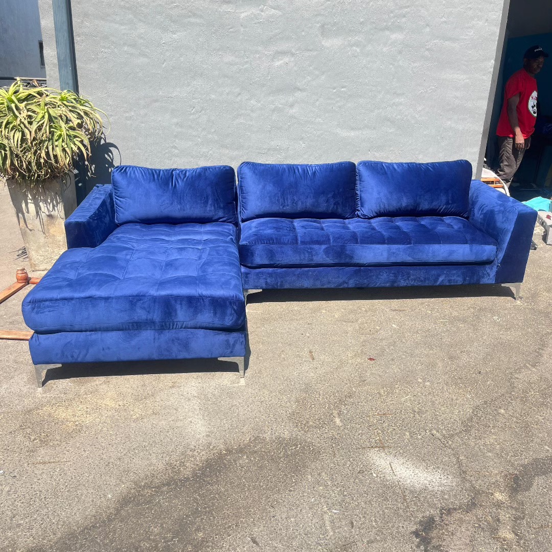 Full view of the finished blue velvet L-shape sectional couch