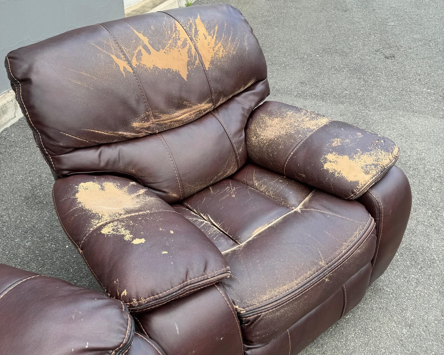 Genuine leather recliner arm and back detail