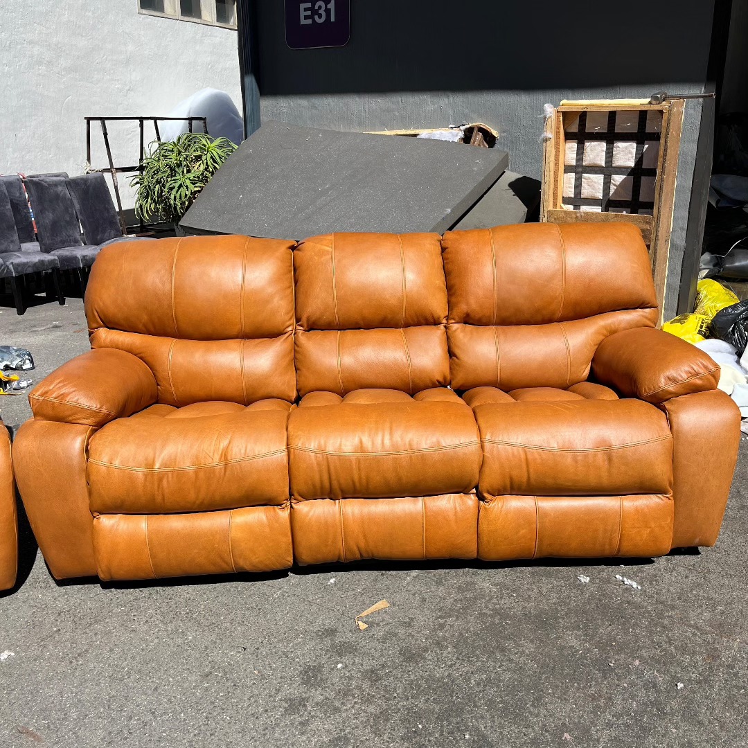 Genuine leather couch rebuilt by Wan-Puck Upholstery