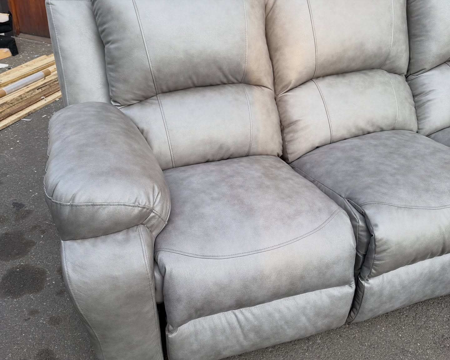 Grey buffalo leather couch seat detail