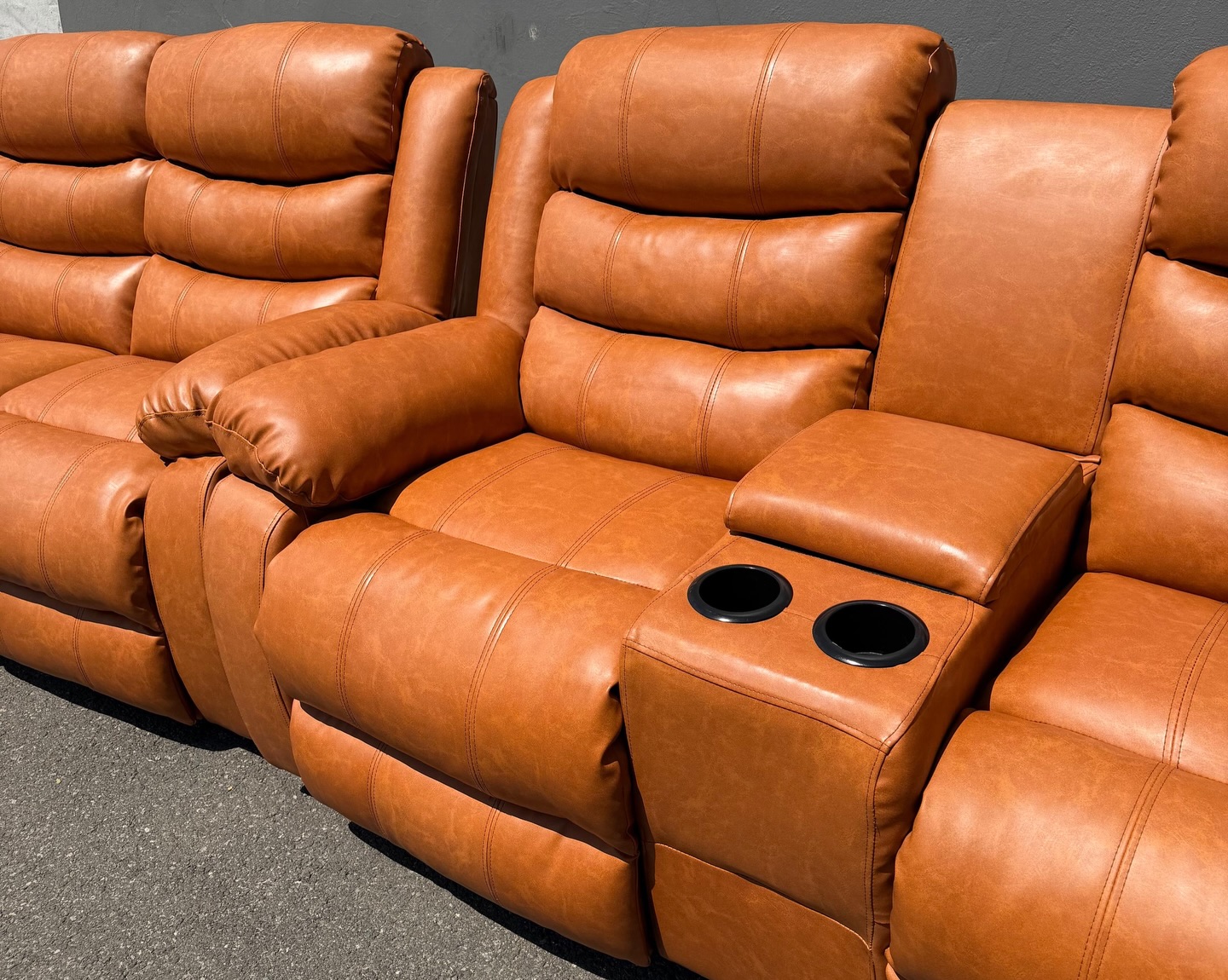 Finished tan Euro leather recliner set ready for delivery